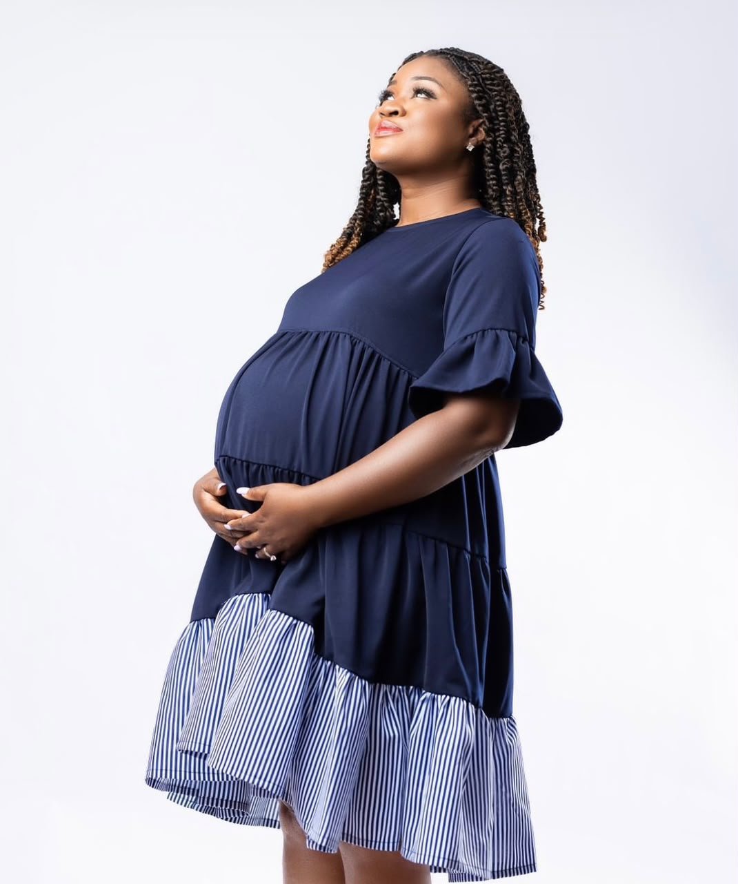 Pregnant woman in comfortable maternity outfit